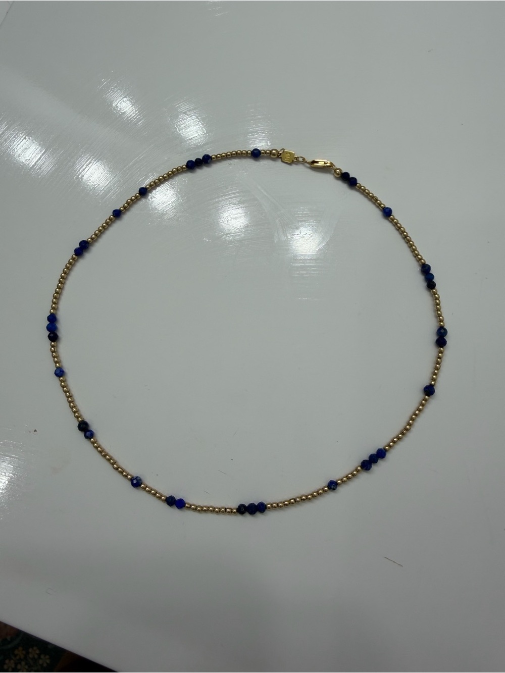Enewton Gold Beaded Necklace with Navy Blue Accent Beads